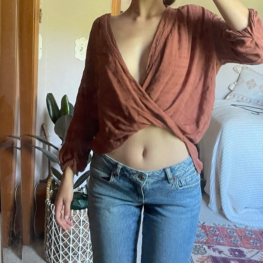orange drapey top